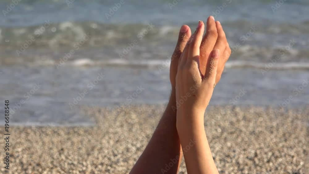 Gentle touch, lovers hands playing, finger touch, close up, beach, sea waving 4K Gentle touch, lovers hands playing, finger touch, close up, beach, sea waving 4K