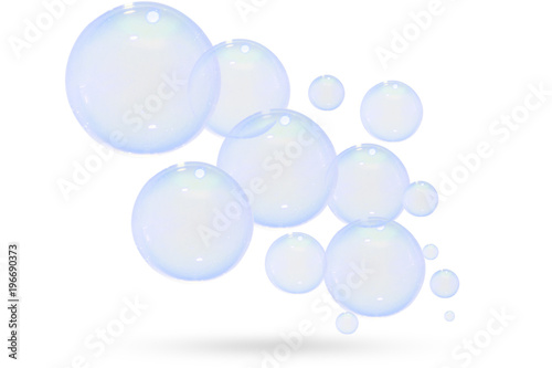 Abstract soap bubbles float isolated on white background