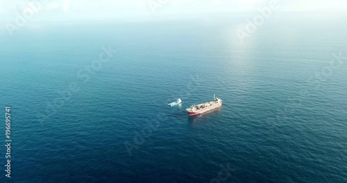 Aerial view of offshore oil installation and supply ship