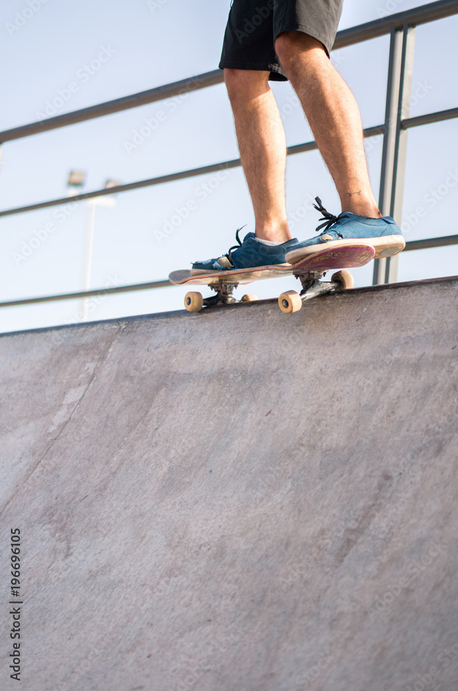 Anonymous man with skate on ramp Anonymous man with skate on ramp