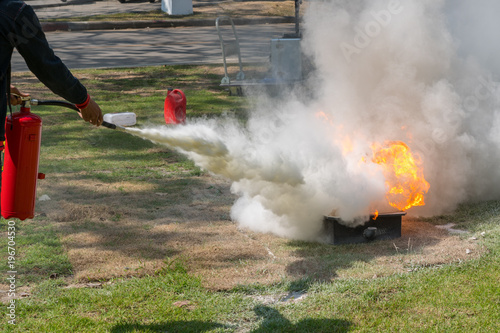 Demonstration of the fire with a fire extinguisher.