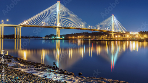 Port Mann Bridge, long exposure in a bright night. Vancouver, British Columbia, Canada.