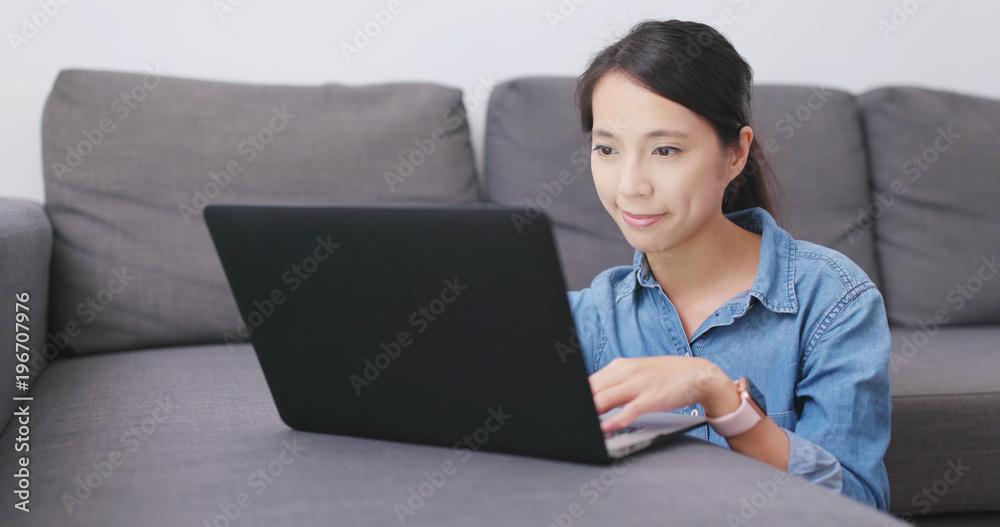 Woman watching on laptop computer Woman watching on laptop computer