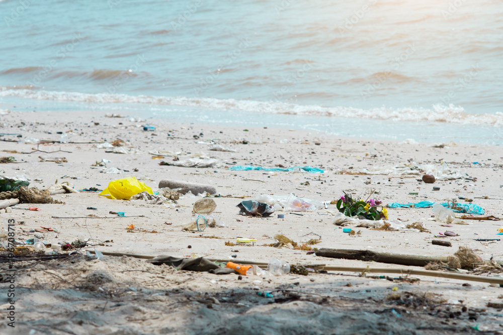 Garbage on the beach is polluting the waste. Garbage on the beach is polluting the waste.