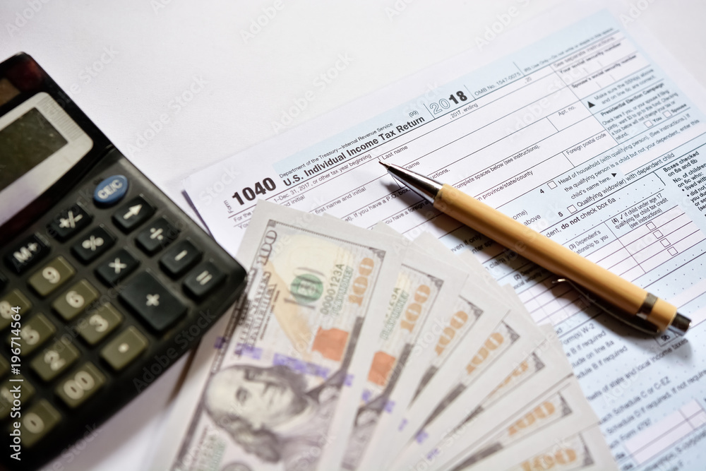 American tax form 1040 on white background. Fill-up American tax form. American tax form 1040 on white background. Fill-up American tax form.