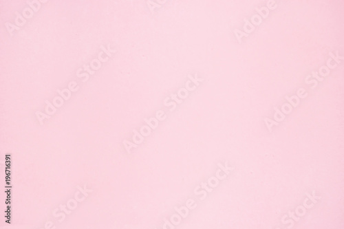 The texture is light pink smooth cement surfaces, pastel abstract background © golubka57
