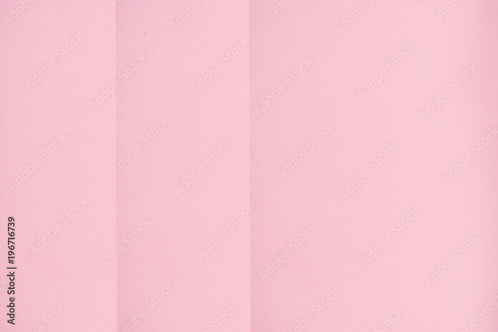 The texture is light pink smooth cement surfaces, pastel abstract background