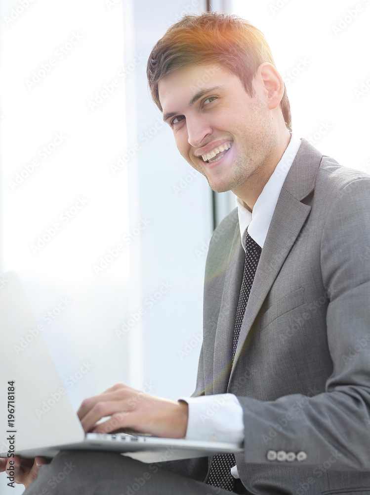businessman talking on the Internet using a laptop businessman talking on the Internet using a laptop