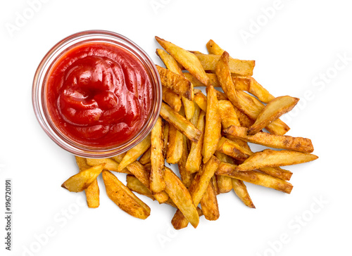 Heap of fried potato with ketchup on white background. Top view.