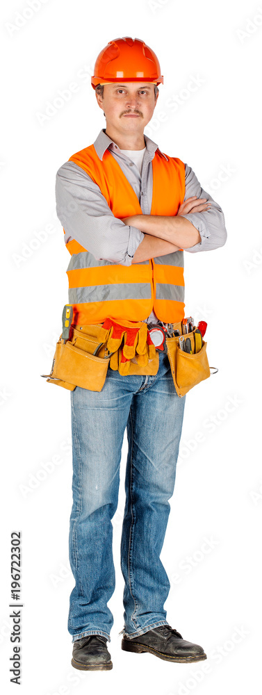 engineer in a helmet crossed arms and looking at camera engineer in a helmet crossed arms and looking at camera