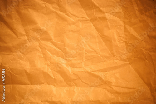 Brown crumpled paper background.