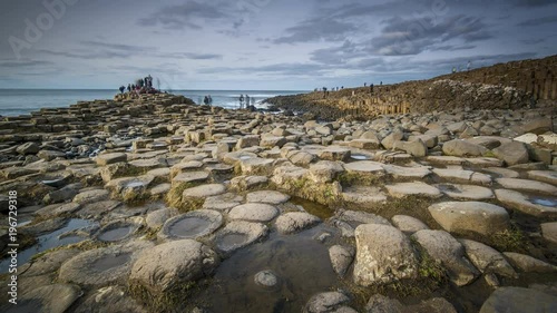 Tourists enjoying the natural wonder of the Giants Causeway in Northern Ireland Time Lapse