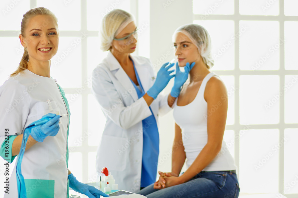 Obraz premium woman getting injection. beauty injections and cosmetology