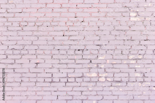 Old shabby brick wall dusty rose color texture