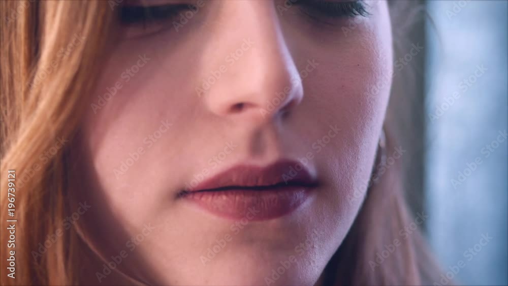 Young woman brown lips and lipstick. 4K. Young woman brown lips and lipstick. 4K.