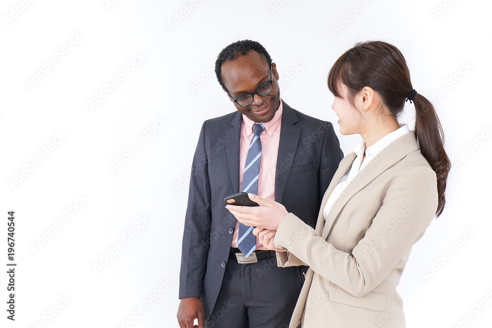 Businesspersons searching location by smartphone Businesspersons searching location by smartphone