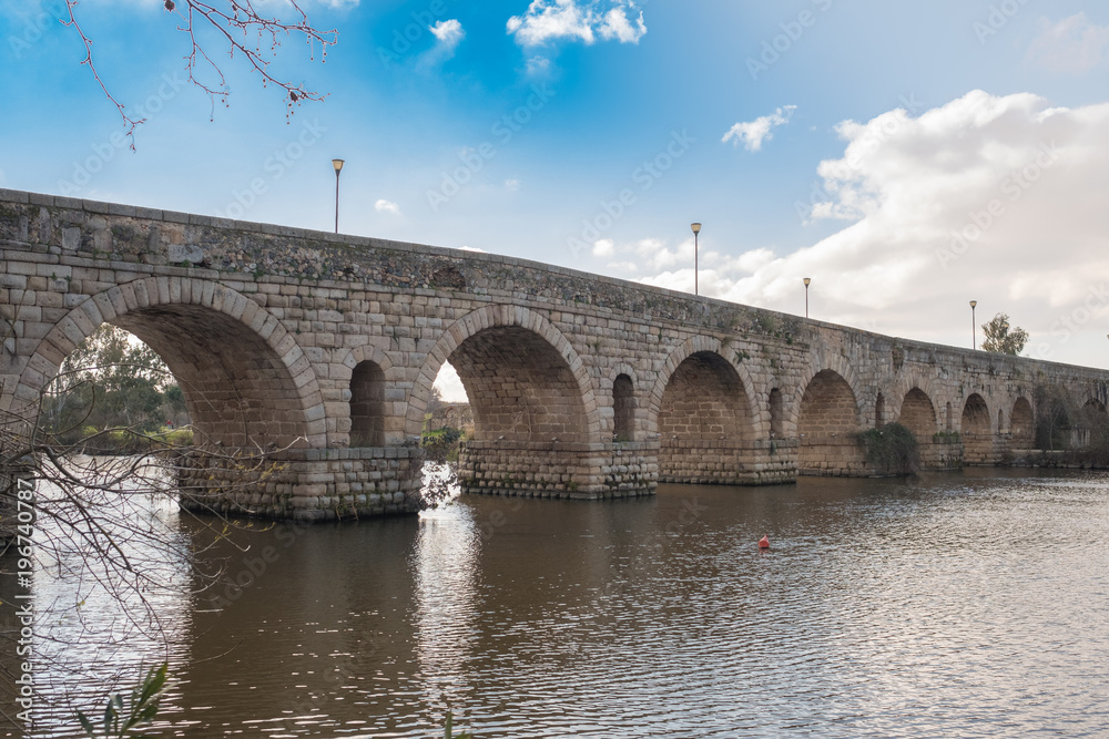 View of the ancient Roman bridge of the city of Merida, ancient Emerita Augusta in Roman times