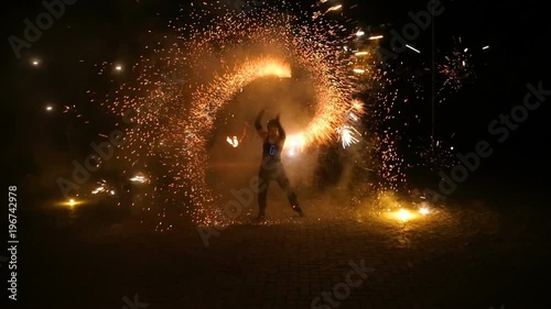 Fire show and a lot of the bright sparks in the night.