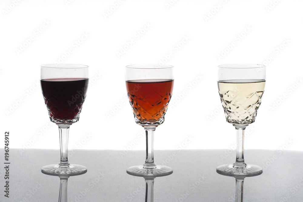 Three glasses of wine, rose wine, red wine, white wine, white background Three glasses of wine, rose wine, red wine, white wine, white background