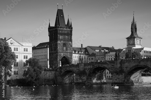 Black-and-white photograph of the Charles bridge. Prague's historical center, photo from the river