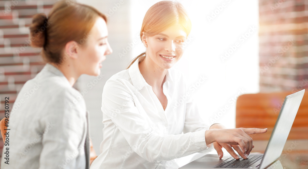 woman Manager shows the client information on the laptop. woman Manager shows the client information on the laptop.