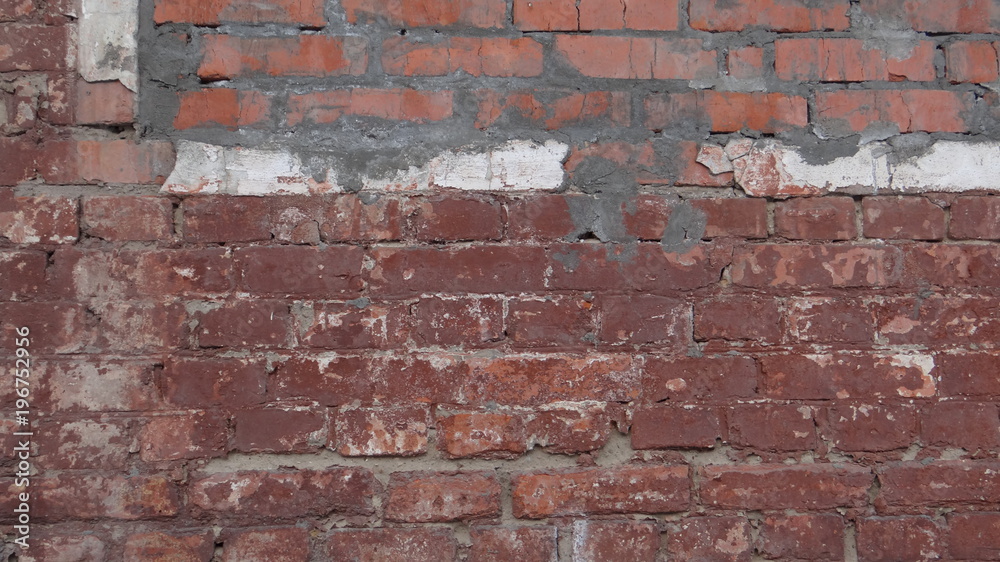 Fototapeta premium The texture of the brick wall and plaster.
