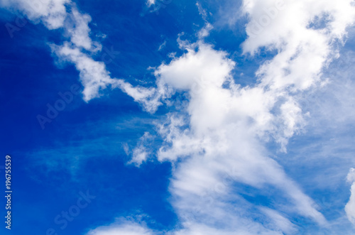 Sky background  fluffy white clouds