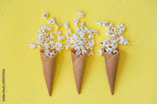 popcorn in a wafer for ice cream on a yellow background