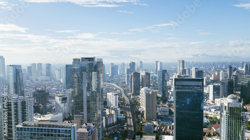 Jakarta downtown cityscape with skyscrapers and apartment buildings at sunny day