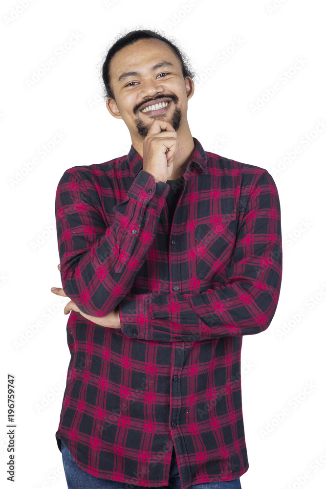 Confident designer student smiling with arms folded Confident designer student smiling with arms folded