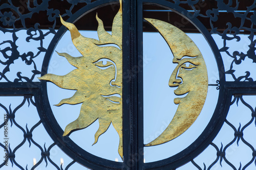 The sun and the moon - symbol on the gate of the tower Syuyumbike photo