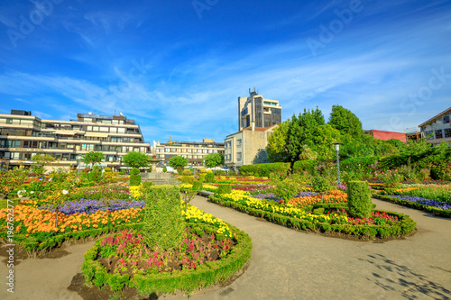 Scenic garden of Santa Barbara or Jardim de Santa Barbara in Braga downtown, north of Portugal. Colorful flowers in the summer season. Copy space.