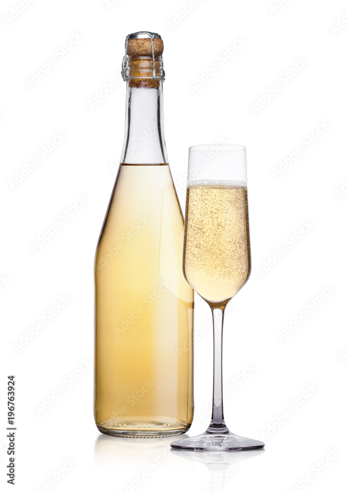 Bottle and glass of yellow champagne with bubbles