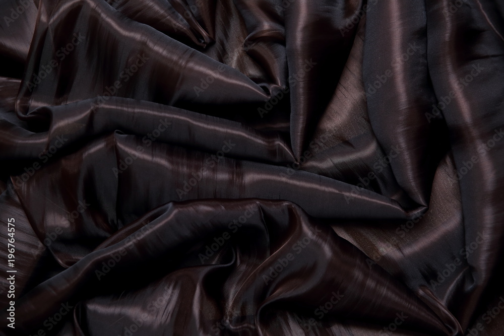 Obraz premium Organtyna is a shiny material which is a material suitable for outfits that are supposed to emphasize status and success. 