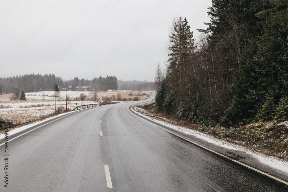 Road view with snowfall Road view with snowfall