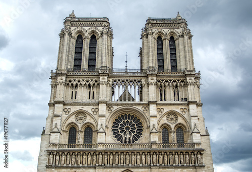 Notre-Dame Cathedral on Cloudy sky in Paris, France