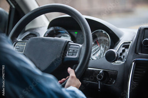 Interior view of a man driving a car © Krzysztof Kusiak