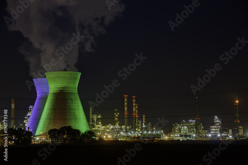 Industrial Refineries at night, with smoke HDR