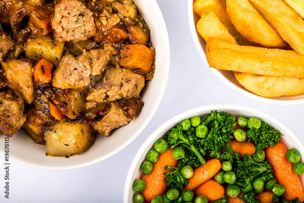 Fototapeta premium Pulled Pork And Stuffing With Root Vegetables