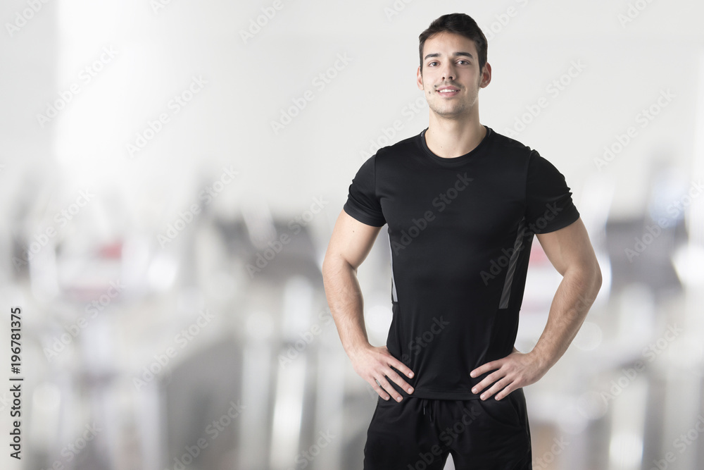 Fototapeta premium Personal Trainer With Hands on Waist