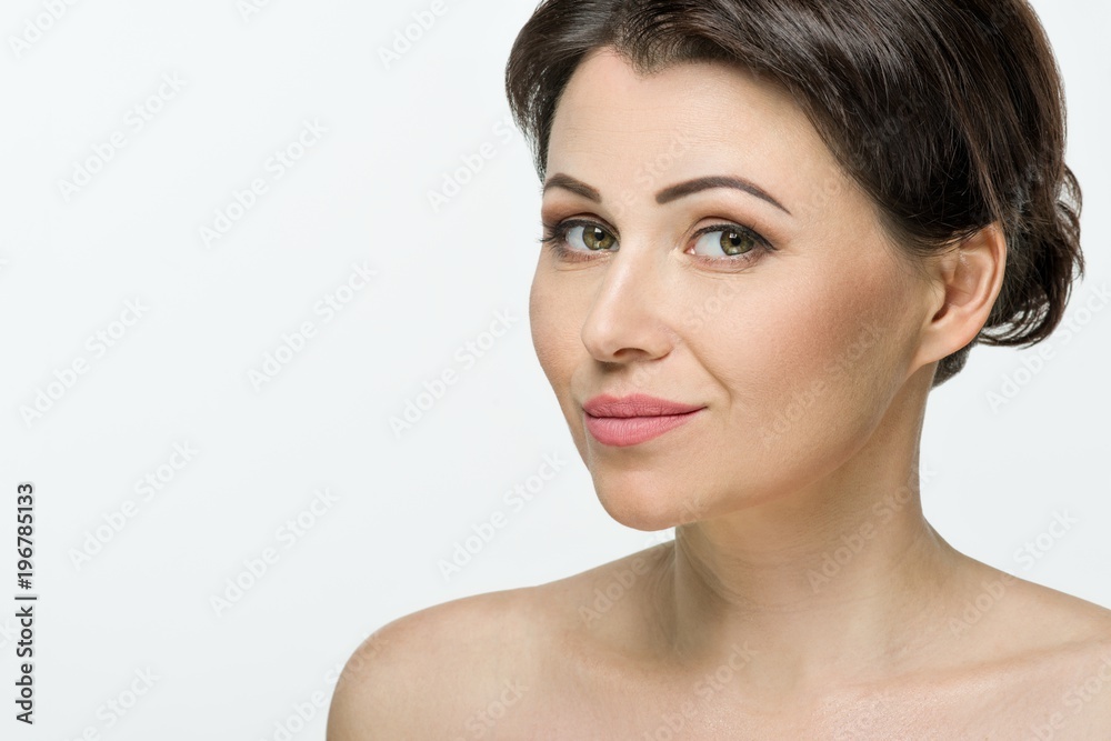 Beauti portrait of adult woman, white studio background, copy space Beauti portrait of adult woman, white studio background, copy space