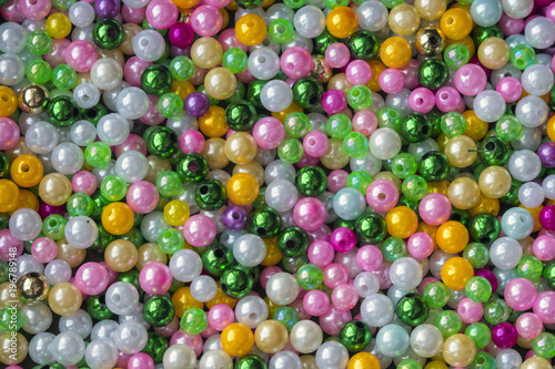 Multicolored beads close-up. Background and texture © YuSafa