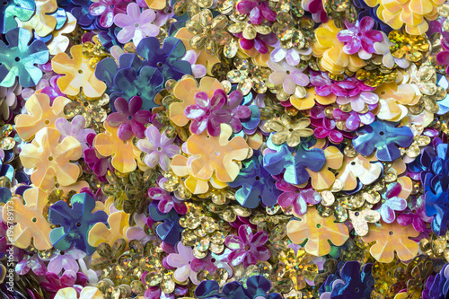 bright shiny sequins in the shape of a flower