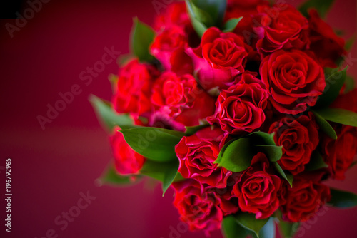 Fototapeta Naklejka Na Ścianę i Meble -  rose bouqet on the red