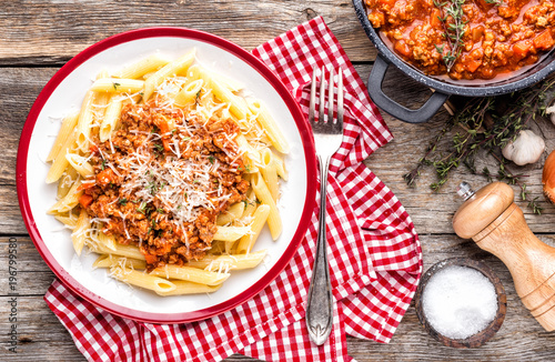 Pasta bolognese. Macaroni served with a classic italian bolognese stew sprinkled with Parmesan cheese