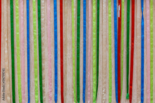 Colorful fabric ribbons play of red blue pink and other colors abstract pattern or texture
