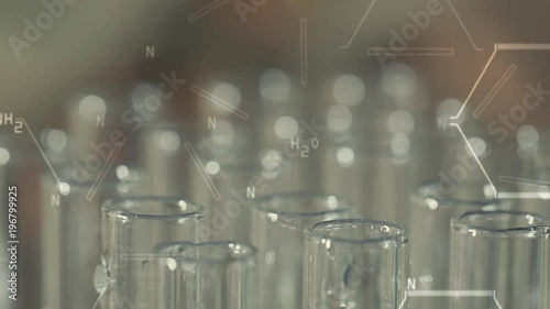 Close up of laboratory scientist working with a pipette analyzes and extract the DNA or molecules in the test tubes with virtual interface.