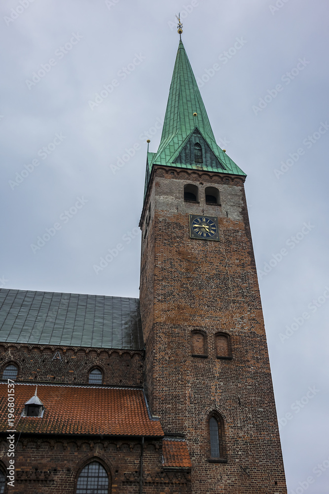 View of Saint Olaf Church (Sankt Olai Kirke). Saint Olaf Church - cathedral church of Elsinore (Helsingor) in north of Zealand, Denmark. Saint Olaf Church built between 1295 and 1559. View of Saint Olaf Church (Sankt Olai Kirke). Saint Olaf Church - cathedral church of Elsinore (Helsingor) in north of Zealand, Denmark. Saint Olaf Church built between 1295 and 1559.