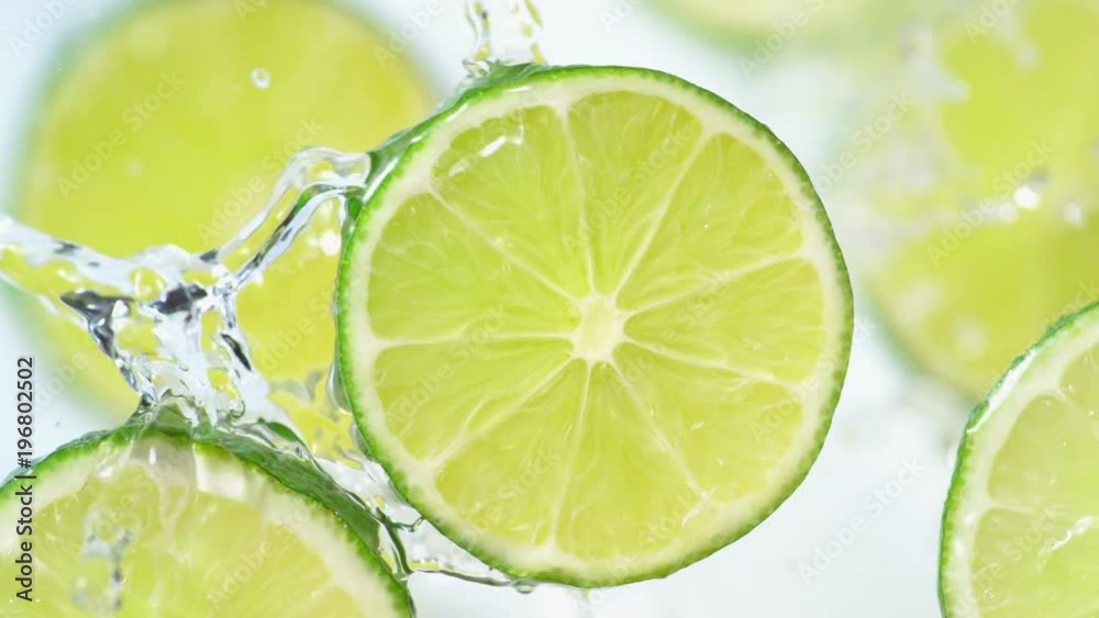 Water splash on sliced lime. Shot with high speed camera, phantom flex 4K. Slow Motion.