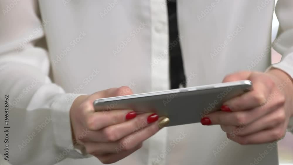 Close up woman using smartphone. Beautiful female hands playing game on smartphone close up. Close up woman using smartphone. Beautiful female hands playing game on smartphone close up.